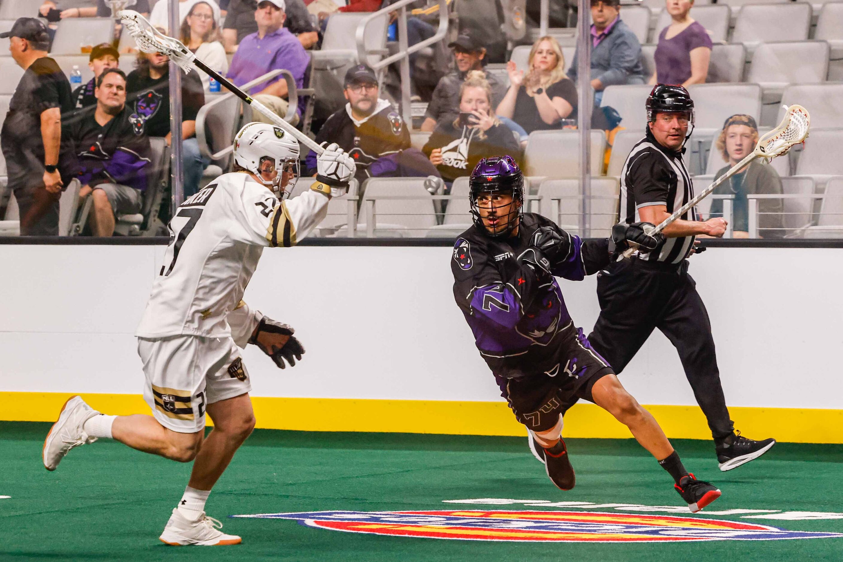 Panther City Jeremy Thompson (74) tries to make a pass through Vancouver Warriors Owen...