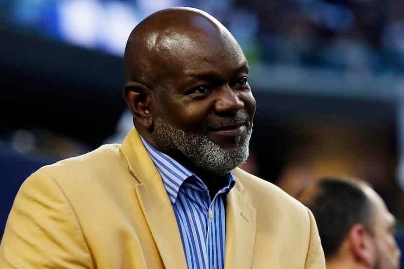 Former Dallas Cowboys RB Emmitt Smith watches the pregame workout from the stands before a...