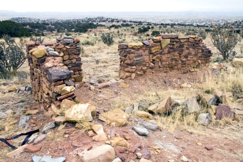 Crumbling rock houses and glass and iron artifacts are all that remain of a Spanish village...