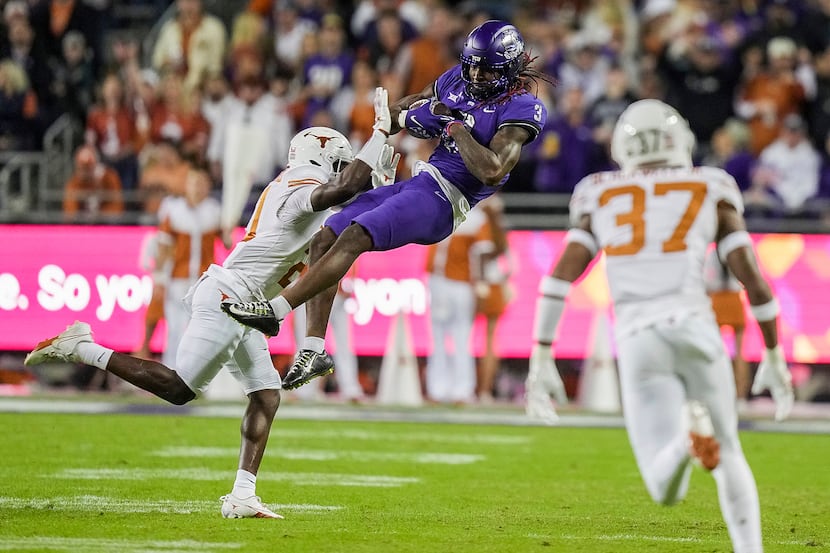 TCU wide receiver Savion Williams (3) catches the ball for a first down against Texas...