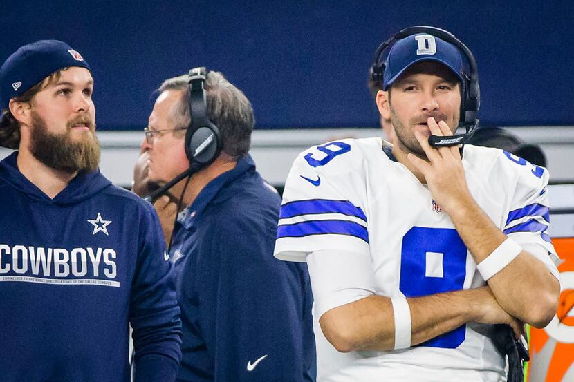 Dallas Cowboys quarterback Tony Romo watches from the sidelines during the second half of an...