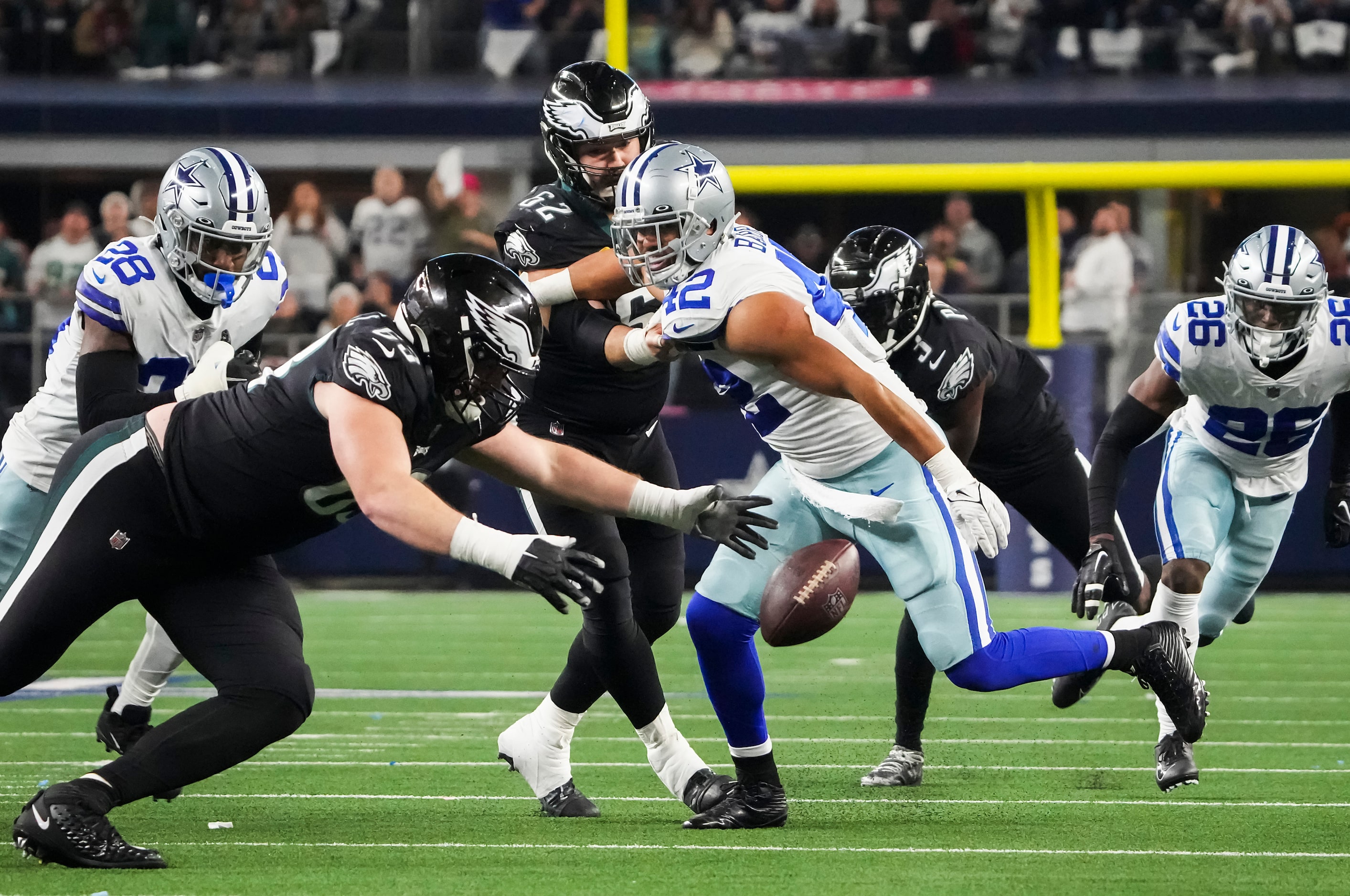 Dallas Cowboys linebacker Anthony Barr (42) chases a fumble by Philadelphia Eagles running...