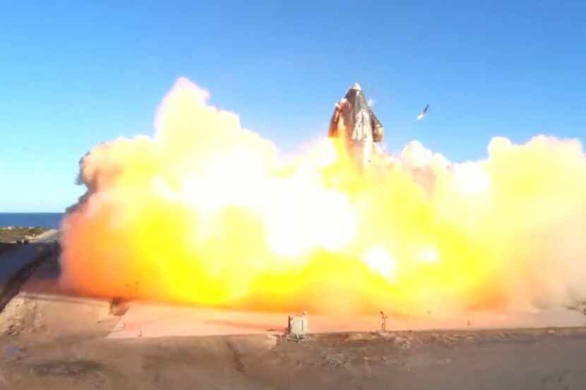 This SpaceX video frame grab image shows SpaceX's Starship SN8 rocket prototype crashing on...