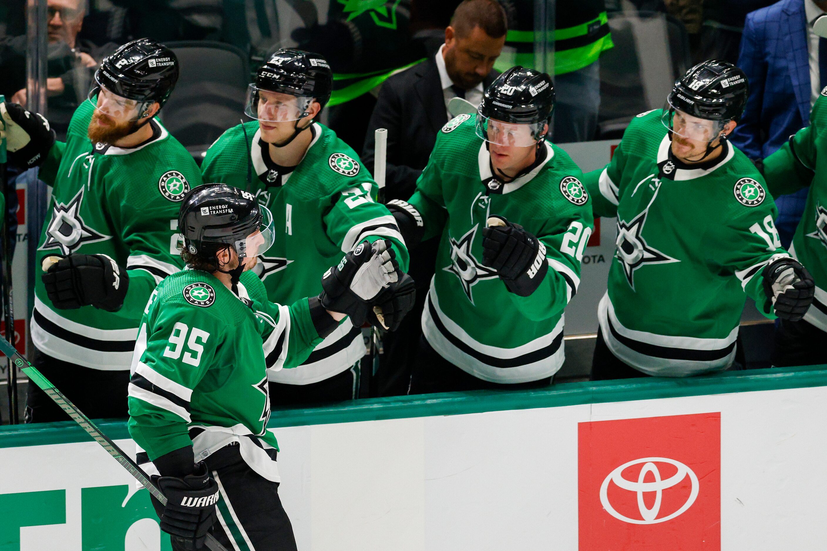 Dallas Stars center Matt Duchene (95) high-fives teammates after scoring during a shootout...