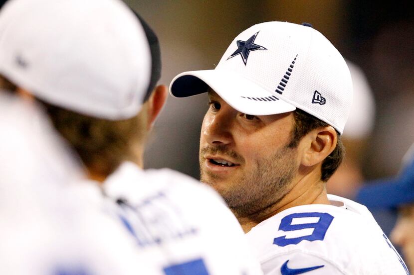 Dallas Cowboys quarterback Tony Romo (9) on the sideline during a game against the Miami...