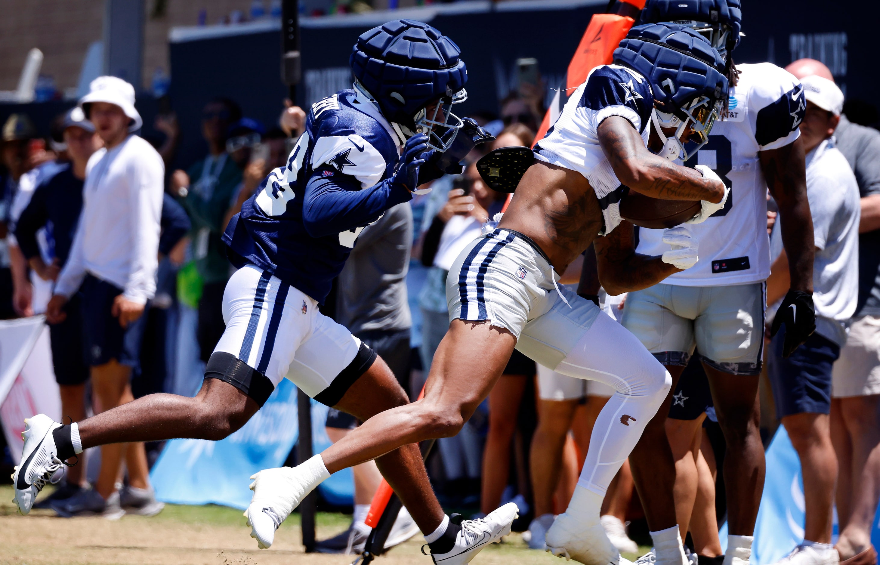 Dallas Cowboys wide receiver Tyron Billy-Johnson (13) catches pass along the sideline as...