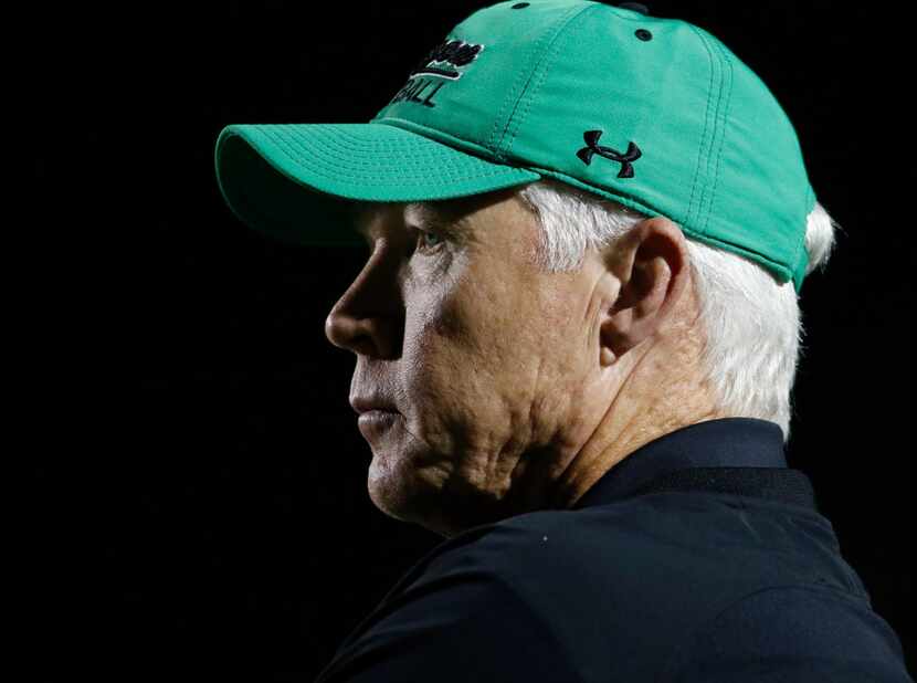Southlake Carroll head coach Hal Wasson looks on from the team bench area during first...