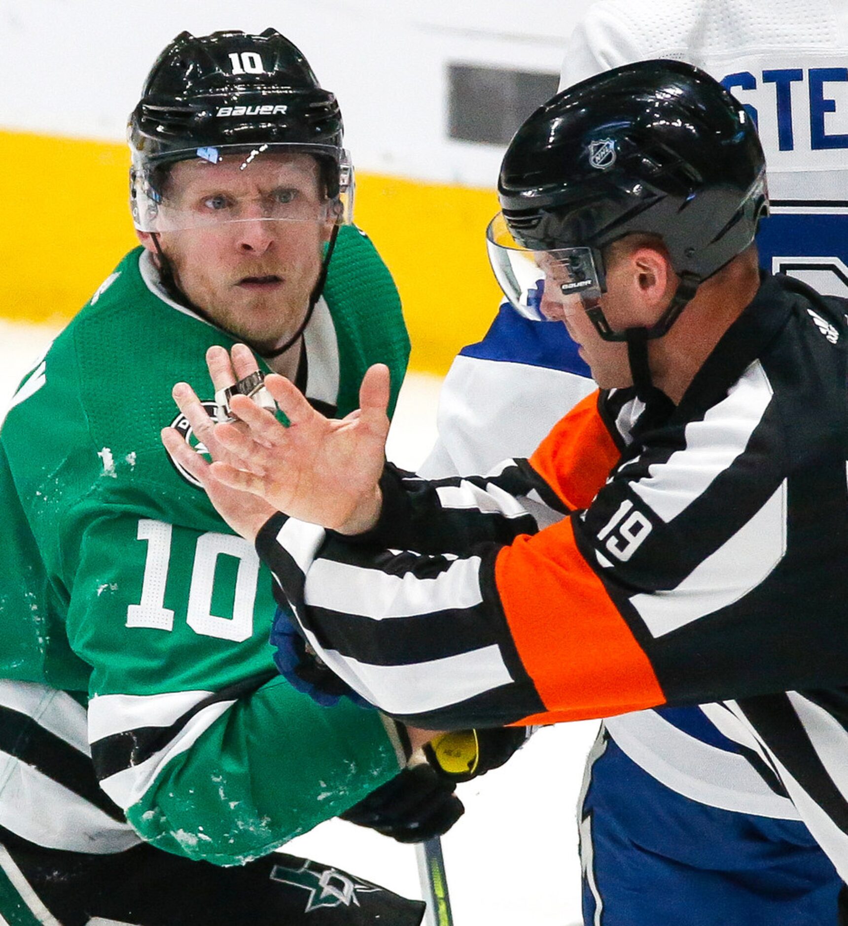 Dallas Stars right wing Corey Perry (10) reacts to a call by referee Gord Dwyer (19) during...