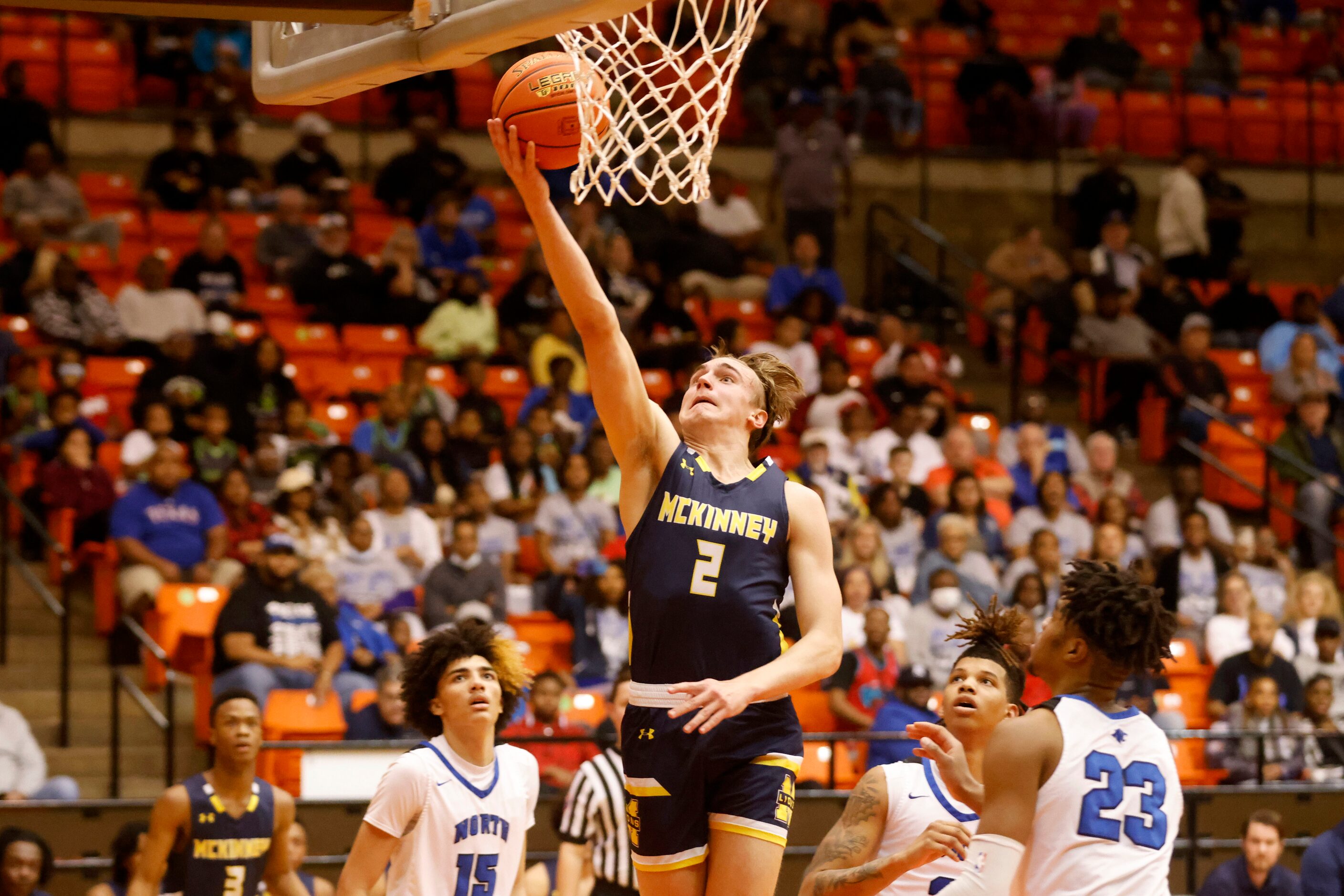 McKinney’s Jackson Steele (2) makes a layup in front of North Crowley defenders during the...