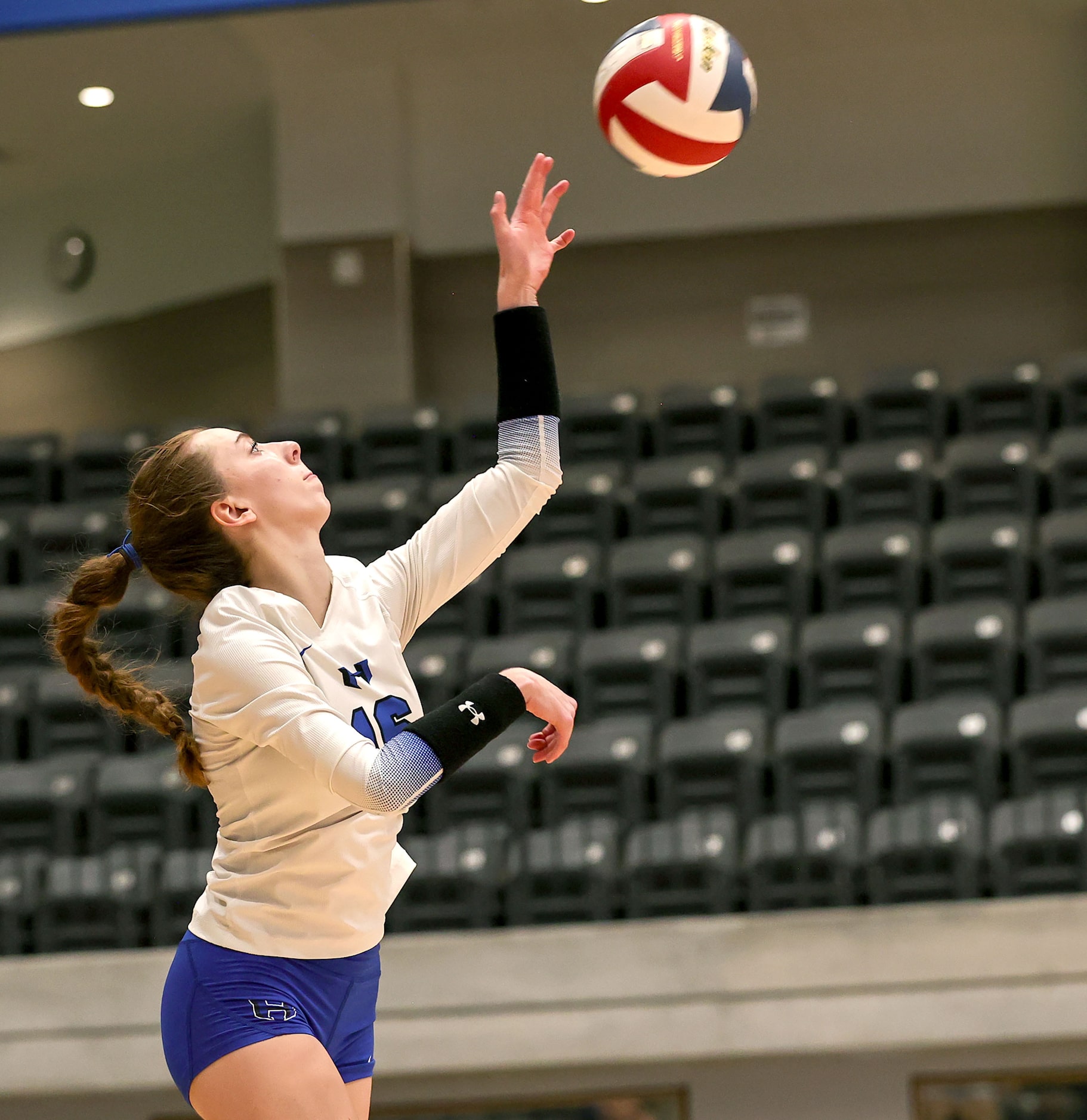 Hebron's Cadence McDonald serves the ball to Southlake Carroll during a Class 6A Division II...