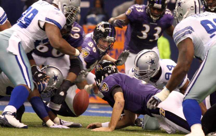  Dallas Cowboys DeMarcus Ware, cq, #94, sacks Ravens quarterback Joe Flacco and cause a...