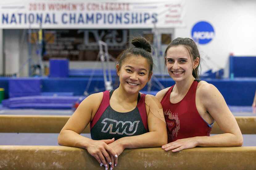 Gymnasts Kyla Podges (left) and Alix Pierce stand for a portrait at Texas Woman’s University...