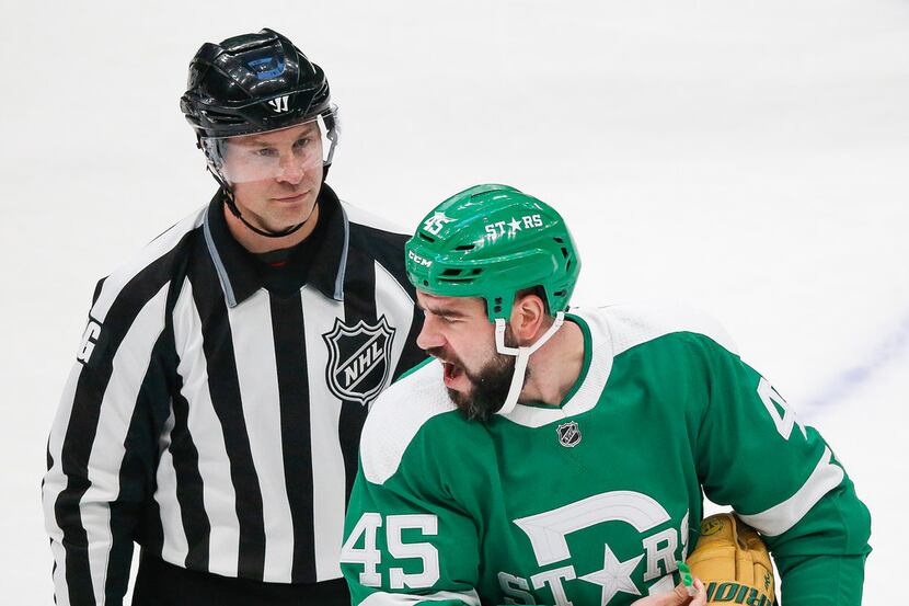 Dallas Stars defenseman Roman Polak (45) is sent to the penalty box during the first period...