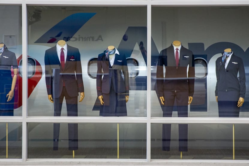 A display case features the newest collection of flight attendant uniforms at the new...