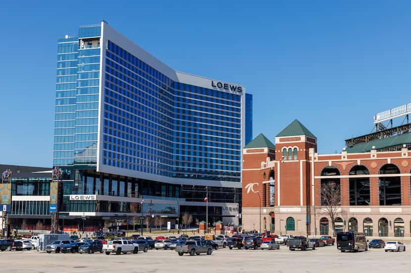 Choctaw Stadium stands next to the recently completed Loews Arlington Hotel and Convention...