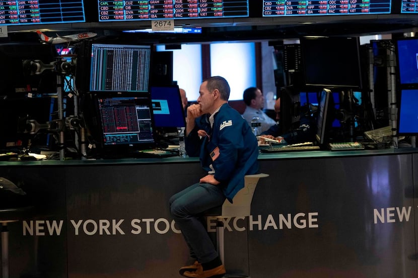 Traders work the floor of the New York Stock Exchange on August 23  in New York. 
