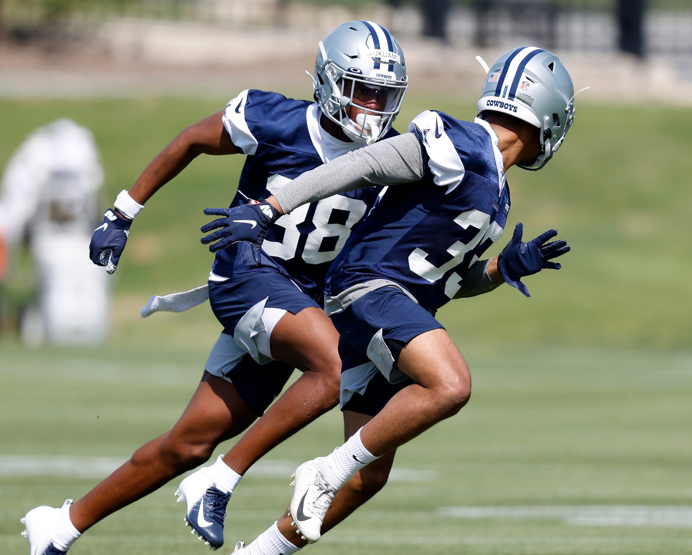 Dallas Cowboys rookie cornerback Israel Mukuamu (38) covers linebacker Tyler Cole (39)...