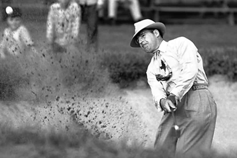Harry "Lighthorse" Cooper hits out of a sand trap during the Victory National Golf...