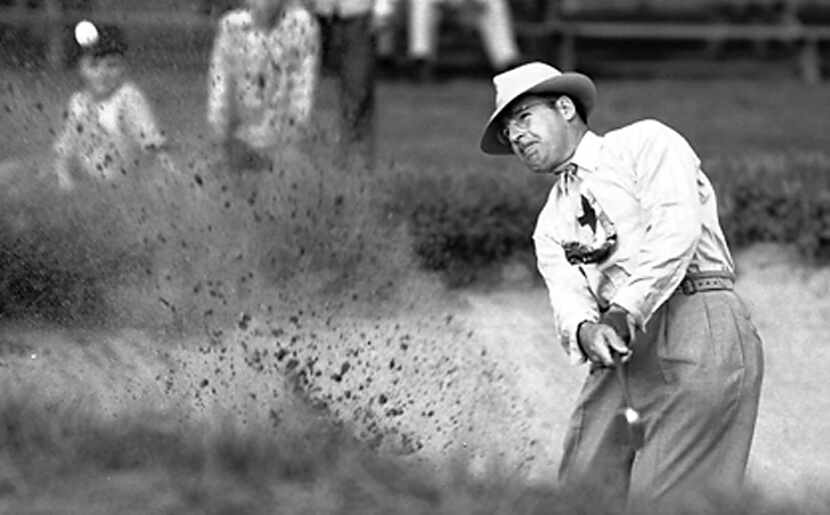 Harry "Lighthorse" Cooper hits out of a sand trap during the Victory National Golf...