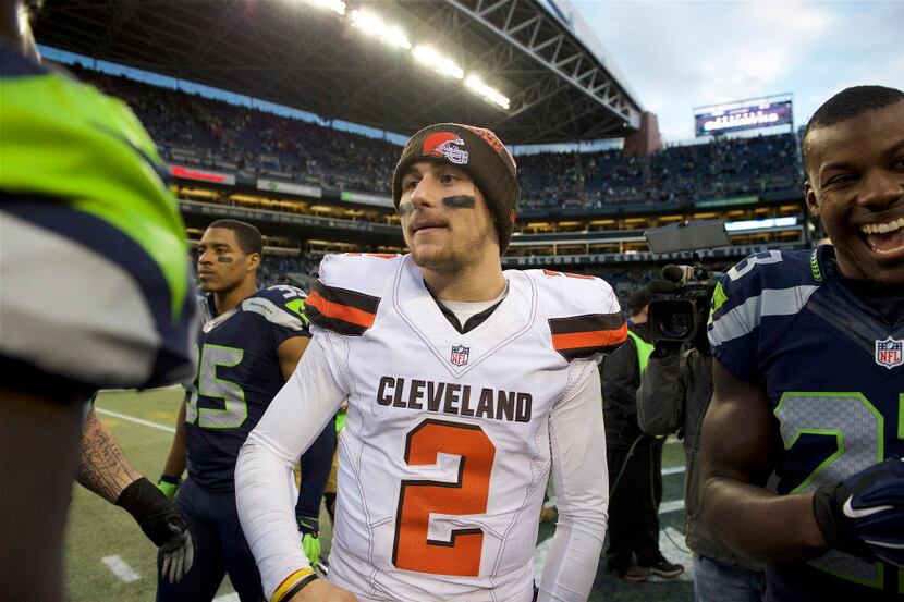 Dec 20, 2015; Seattle, WA, USA; Cleveland Browns quarterback Johnny Manziel (2) greets...