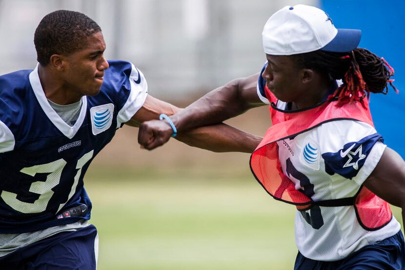 Dallas Cowboys cornerback Byron Jones (31) works against wide receiver Lucky Whitehead (13)...