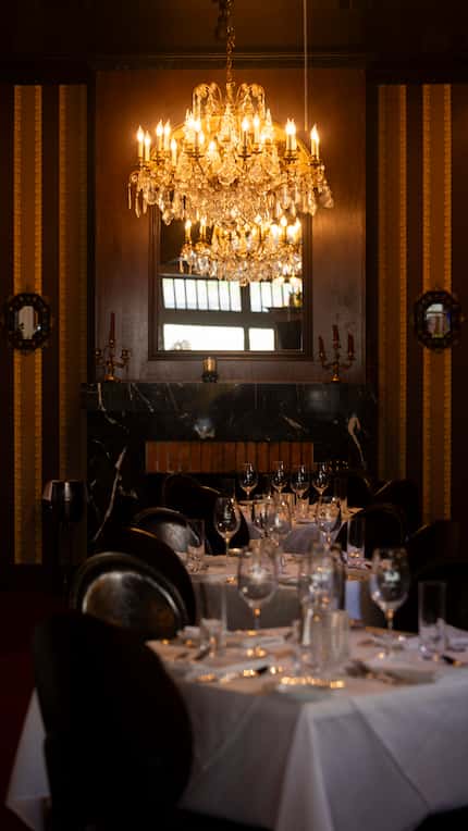 A chandelier hangs over the dining room at St. Martin's Wine Bistro on Monday, March 25,...