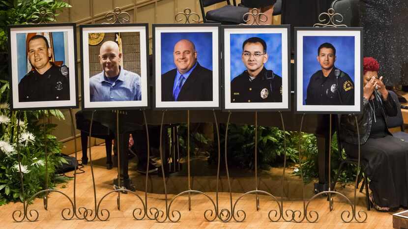 Photos of the five officers killed in the July 7 Dallas ambush were on display during an...