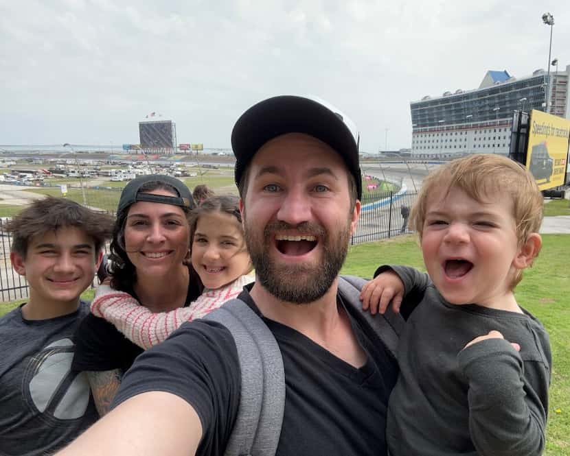 Deric Cahill and his family pose for a selfie at a racing event in April.