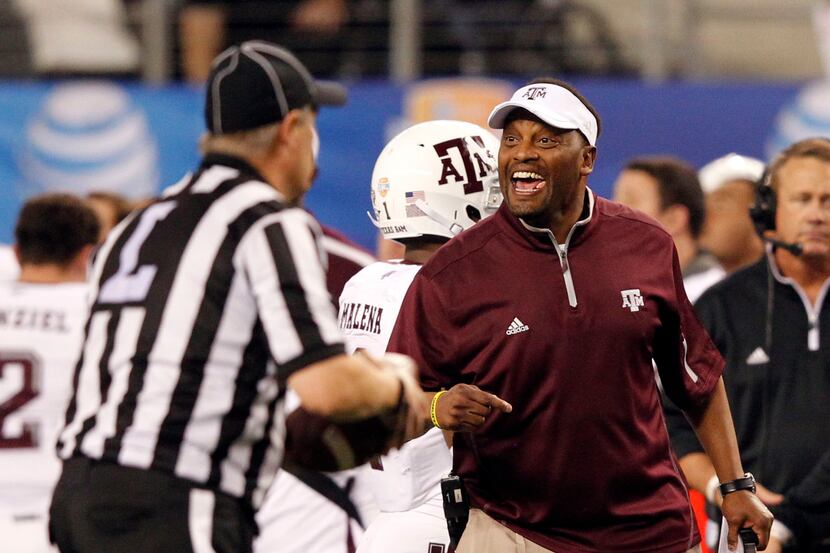 Texas AM Aggies head coach Kevin Sumlin argues with an official after the Oklahoma Sooners...