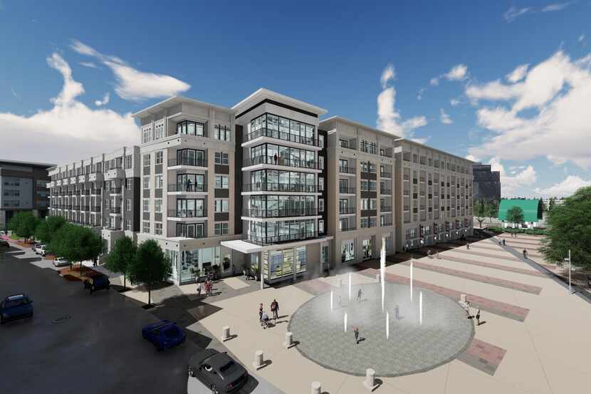 The Ovation at Galatyn Park apartments are under construction next door to DART's light rail...