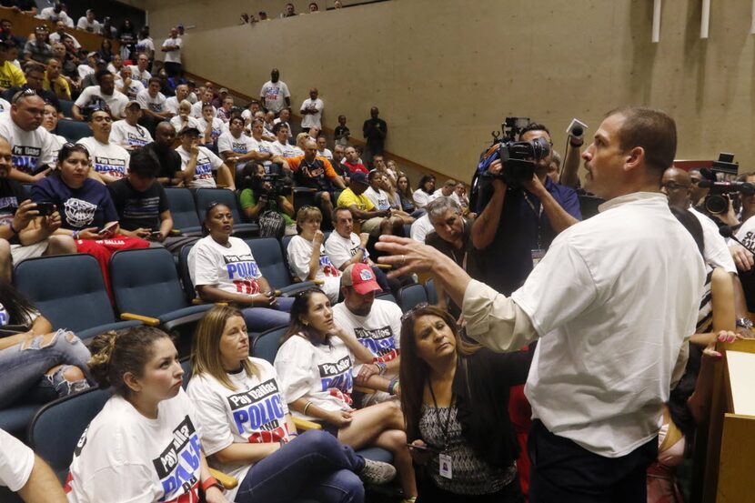 Cristian Hinojosa (right), president of the Dallas Hispanic Firefighters Association, says...