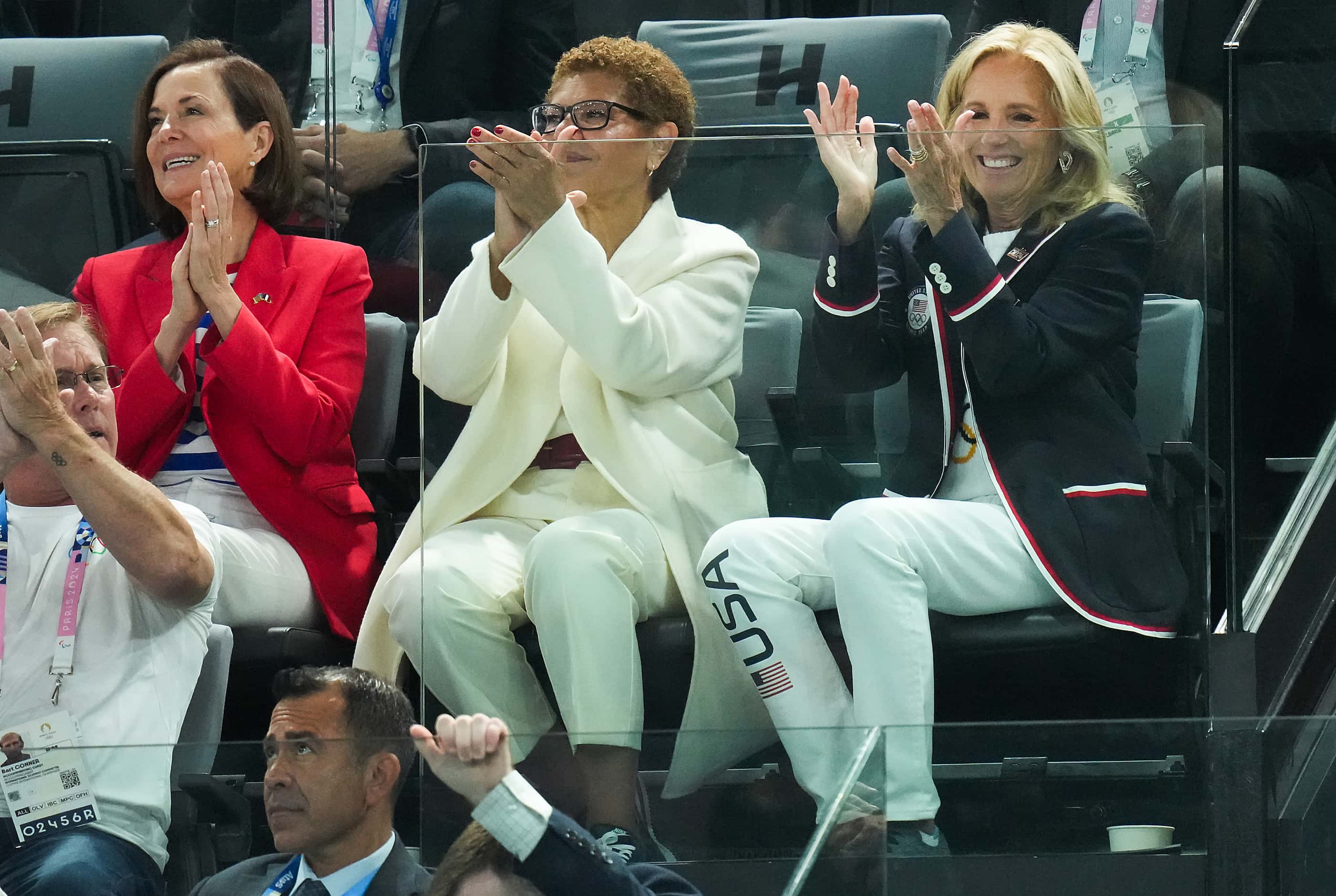 First Lady Jill Biden (right) cheers Team USA while sitting with Los Angeles mayor Karen...