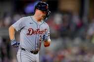 Detroit Tigers' Jake Rogers rounds third base after hitting his second home run of the...
