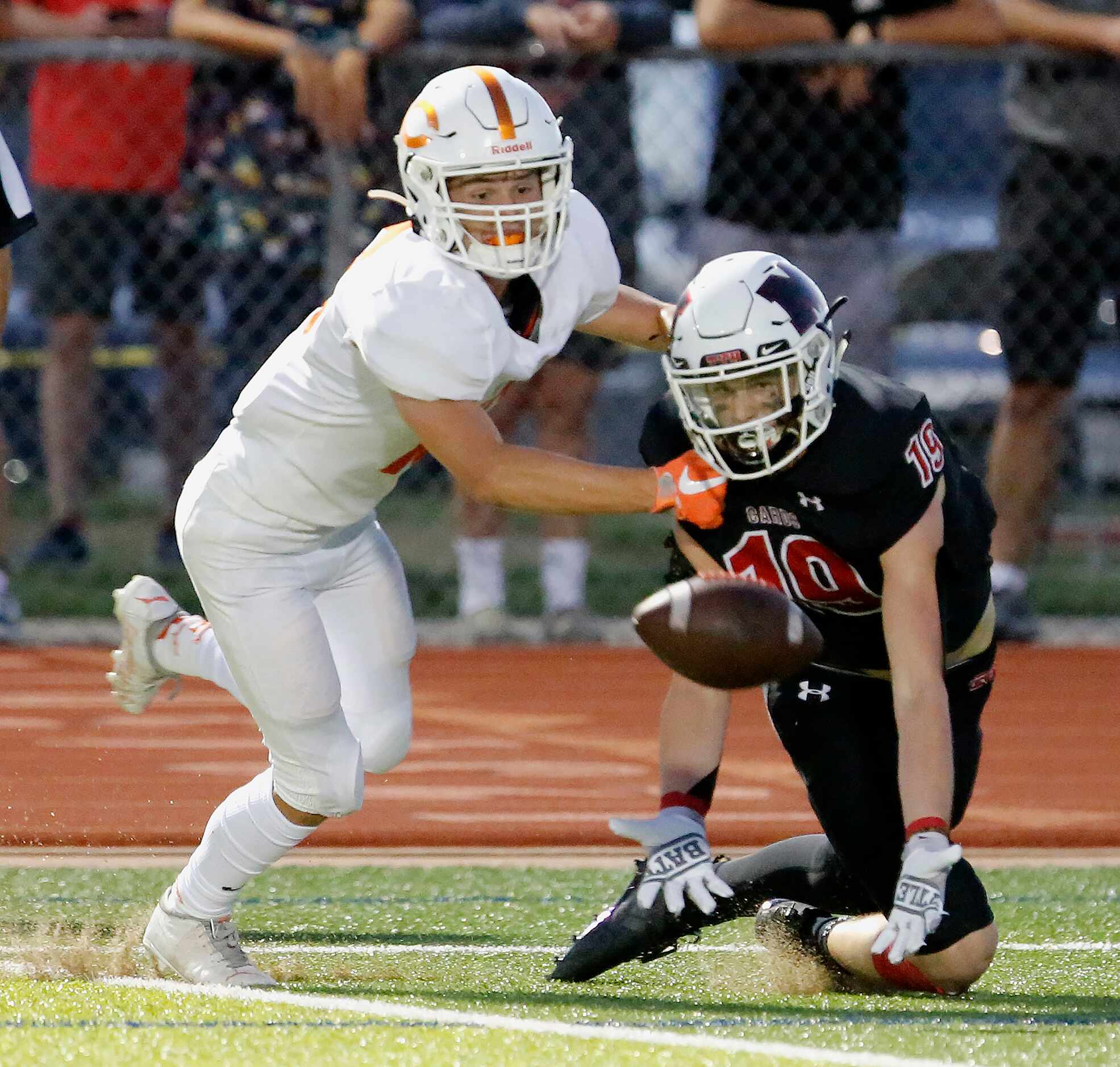 Melissa High School wide receiver Matthew Sanford (19) was unable to come up with the...