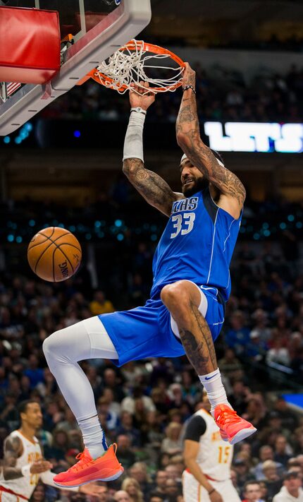 FILE - Mavericks center Willie Cauley-Stein (33) dunks the ball during the first quarter of...