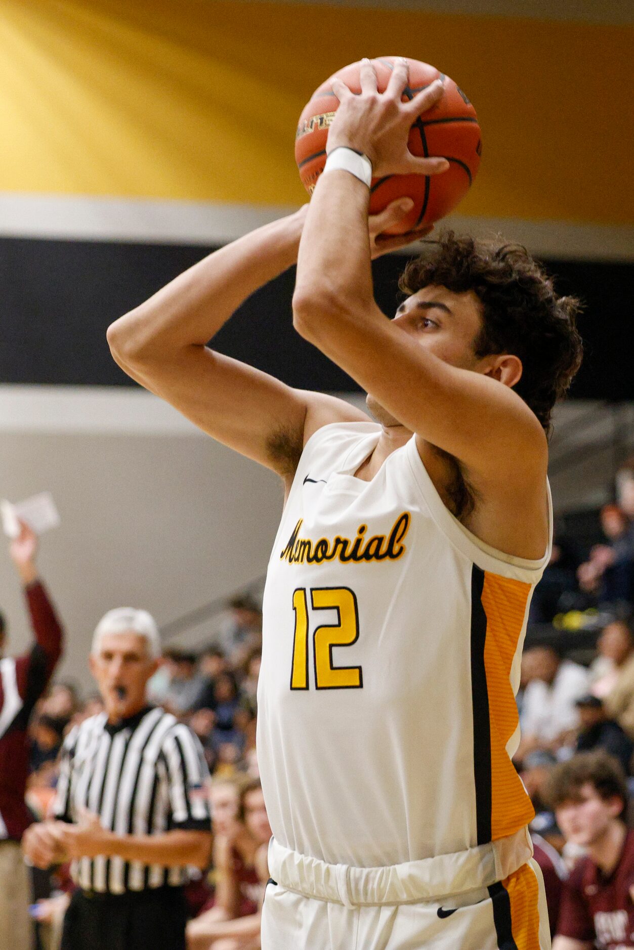 Frisco Memorial guard Jaxson Thomas (12) attempts a three-point shot during the first half...