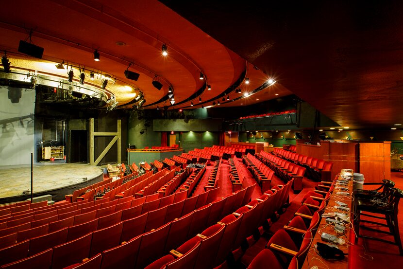 The original gold seating and open theater from 1959 is now bathed in red with the rake...