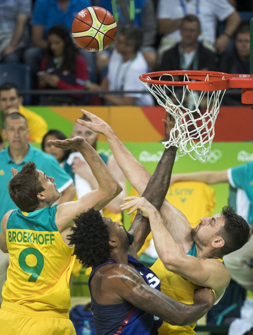 Andrew Bogut (6) of Australia knocks the ball away from DeAndre Jordan (6) of the United...