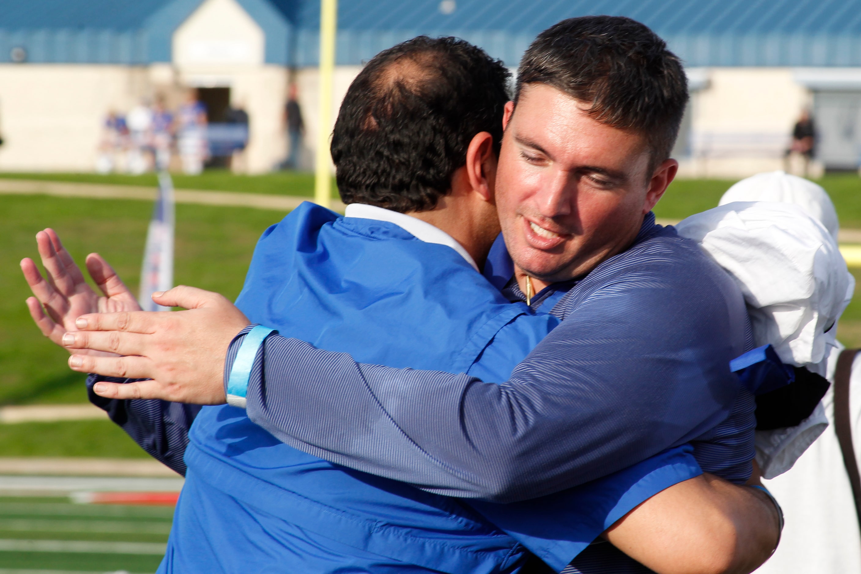 Parish Episcopal head coach Daniel Novakov receives congratulations following his team's...