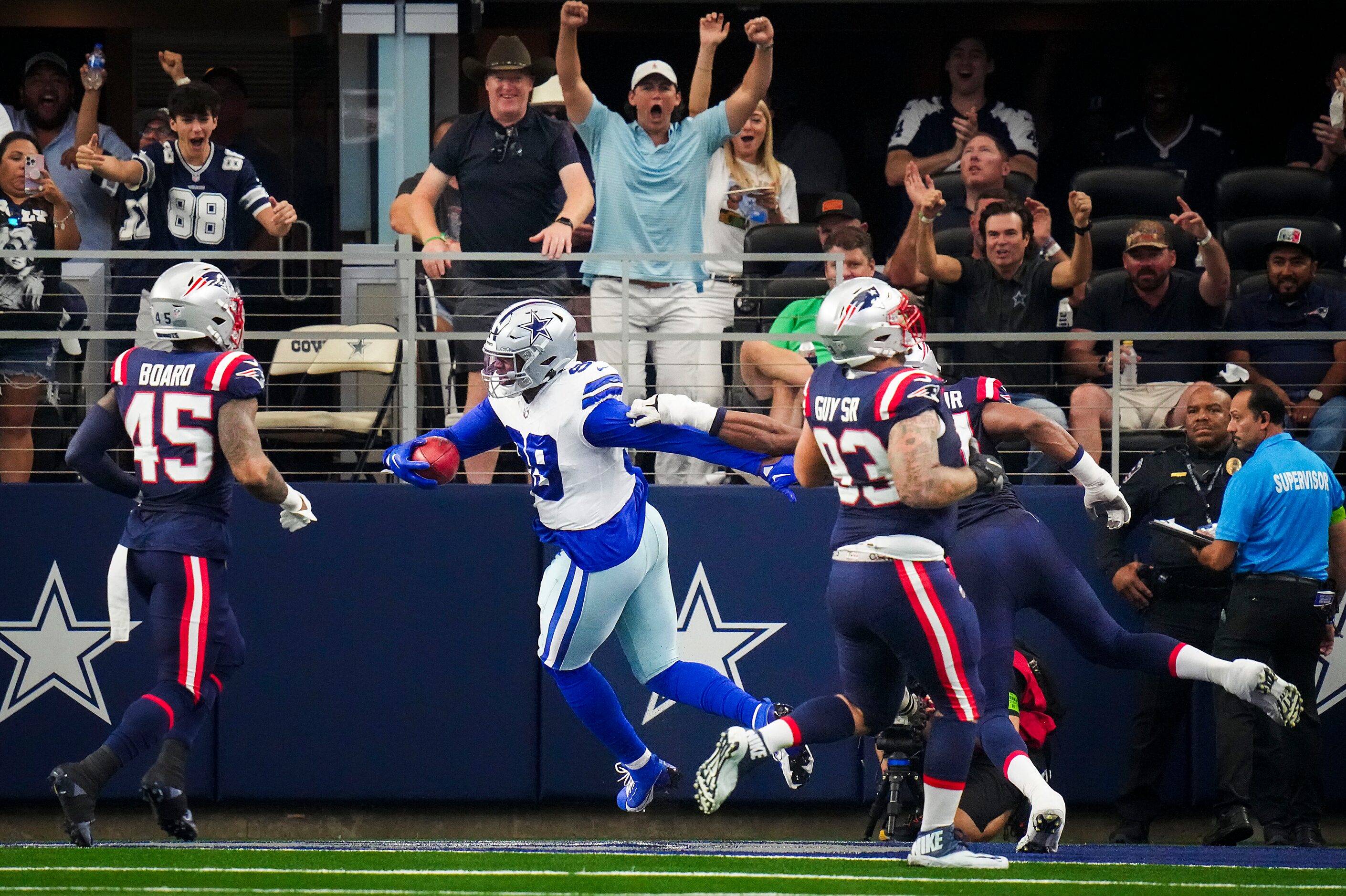 Dallas Cowboys defensive end Chauncey Golston (99) scores a on two-point conversion during...