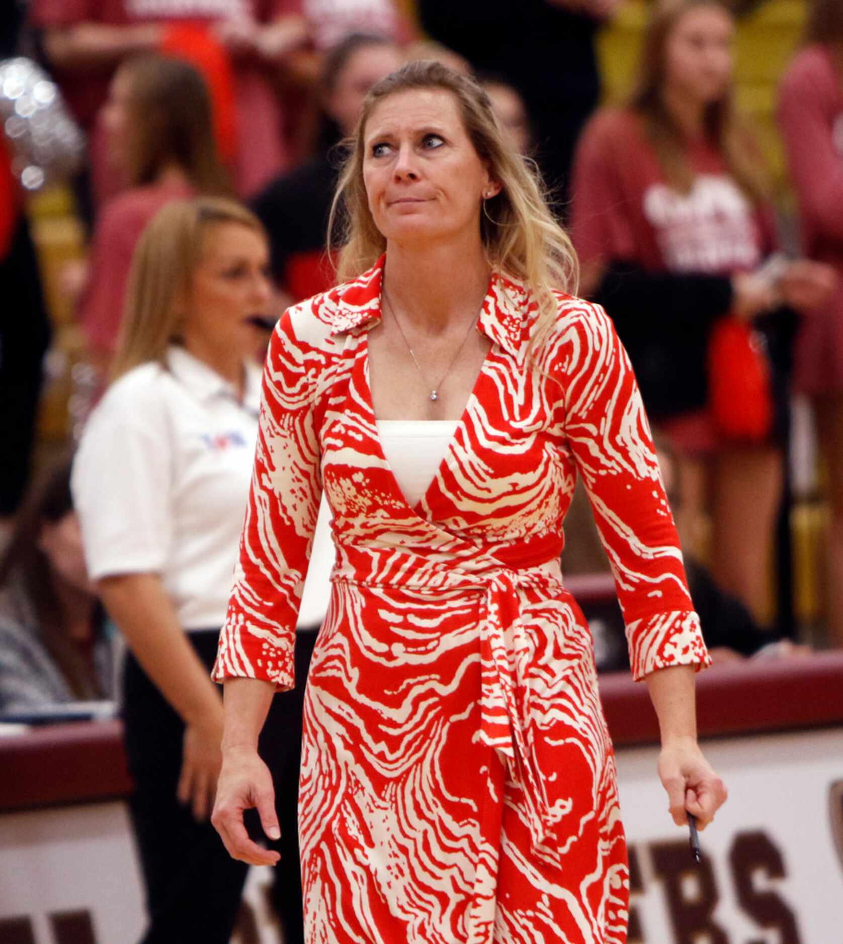 Coppell head coach Julie Price reacts to a referee's call during the second game of their...
