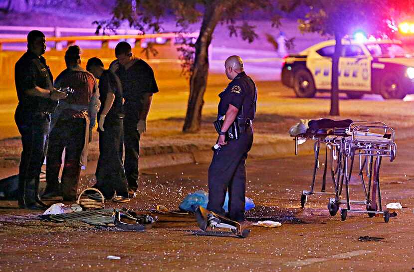  Dallas police investigate an accident that killed four people late Saturday on Webb Chapel...