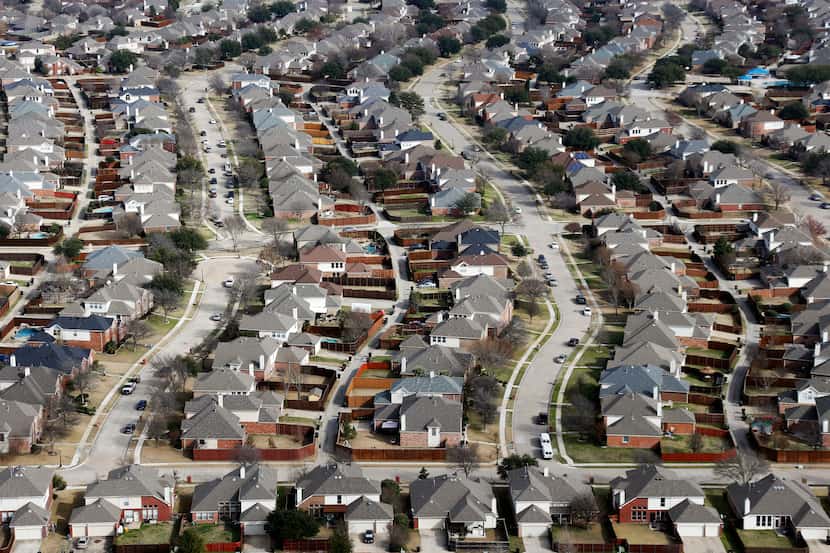 An aerial shot in 2019 shows rows of homes in Plano.