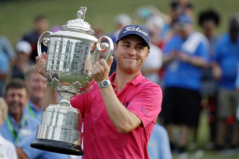 Justin Thomas poses with the Wanamaker Trophy after winning the PGA Championship golf...