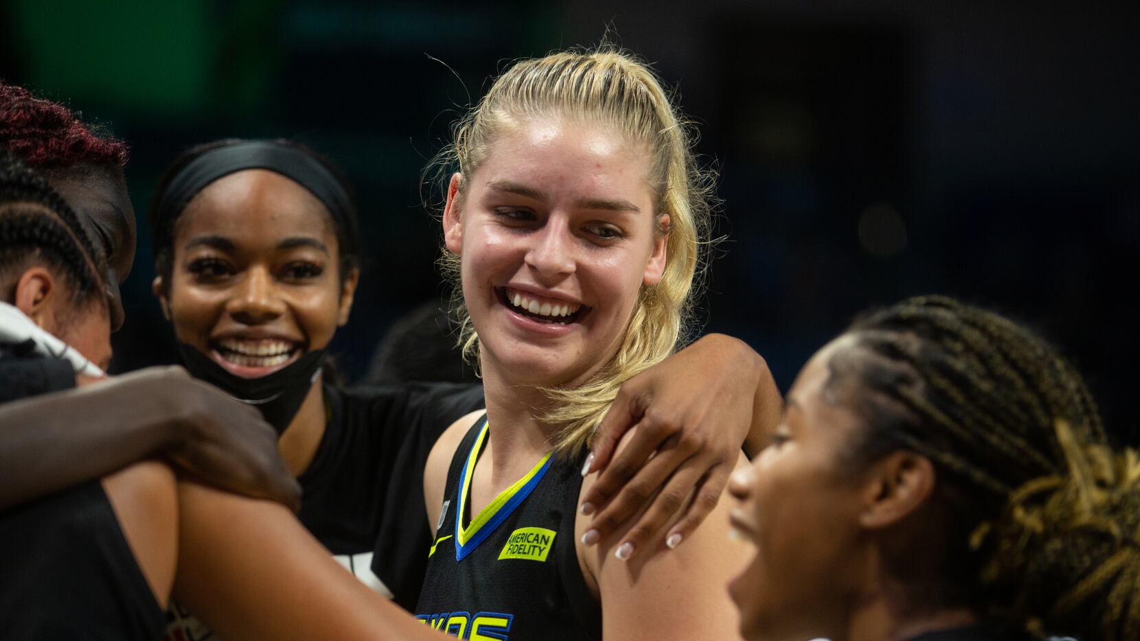 Dallas Wings center Bella Alarie (32) celebrates with teammates after their win against NY...