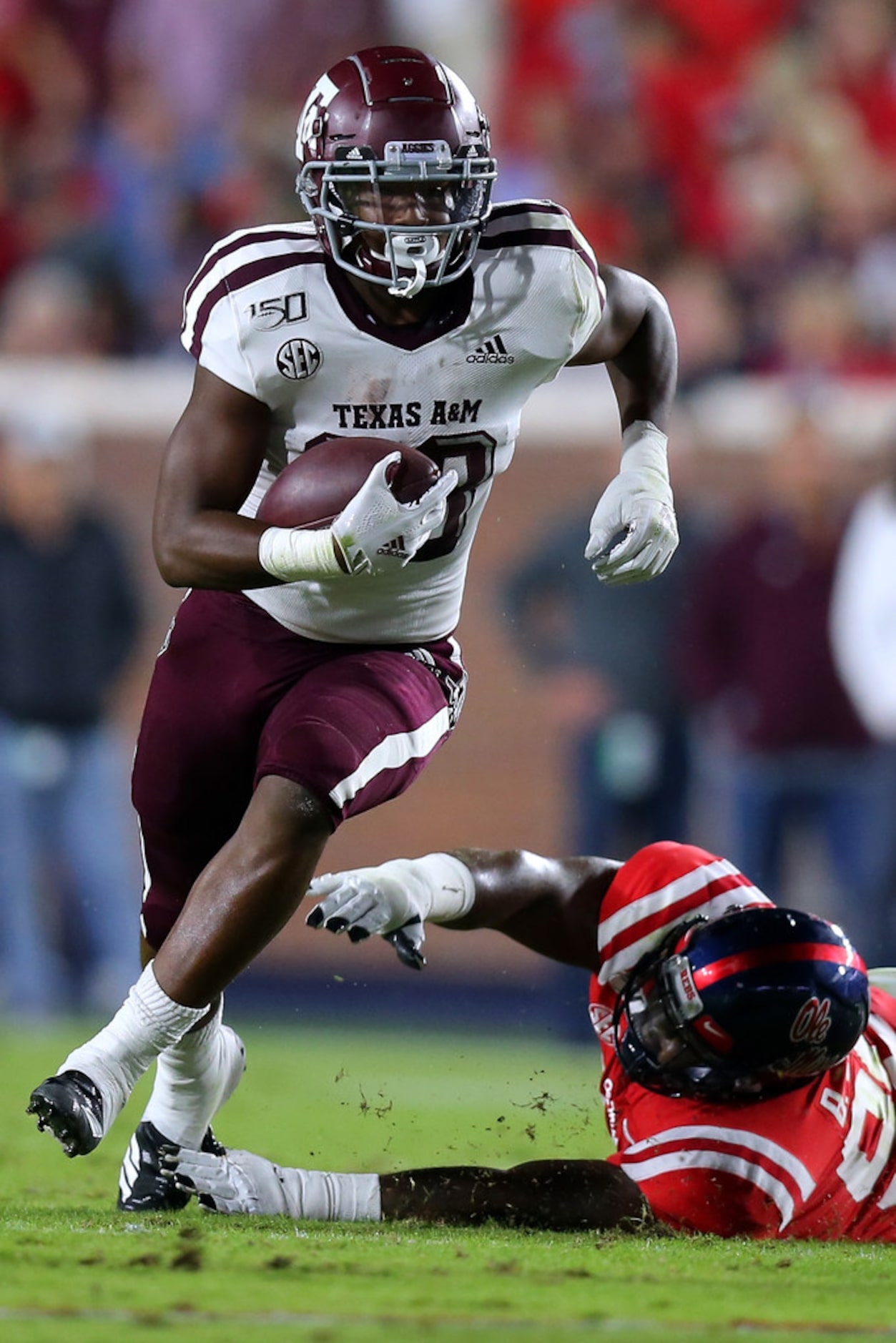 OXFORD, MISSISSIPPI - OCTOBER 19: Isaiah Spiller #28 of the Texas A&M Aggies runs with the...