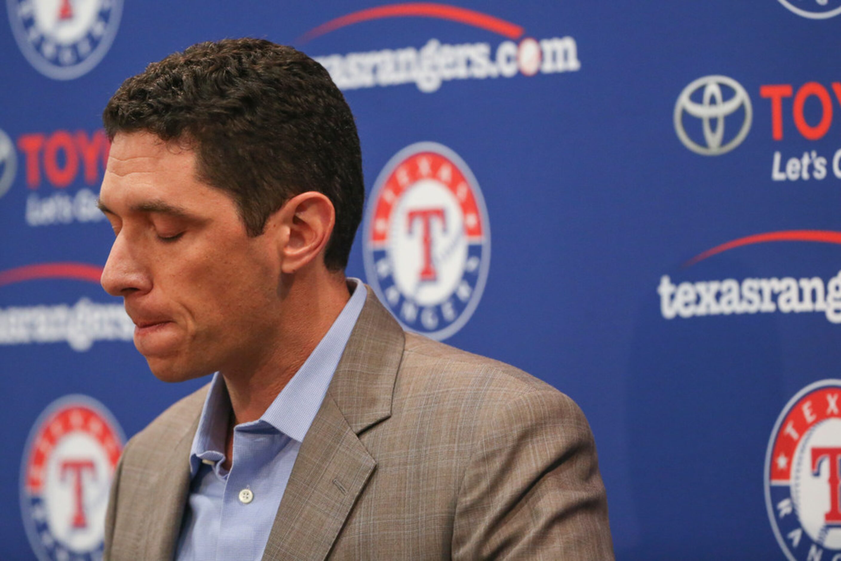 Rangers President of Baseball Operations and General Manager Jon Daniels addresses members...