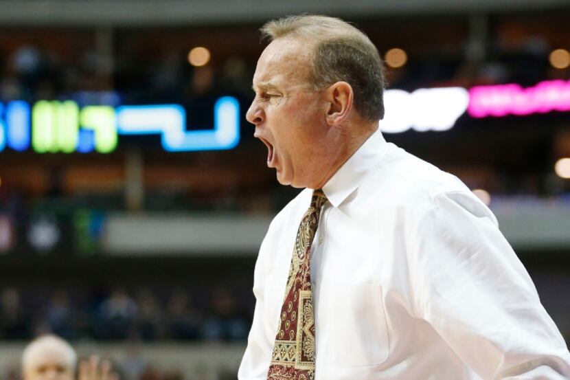 Former Mississippi State Lady Bulldogs head coach Vic Schaefer reacts to a foul called on...