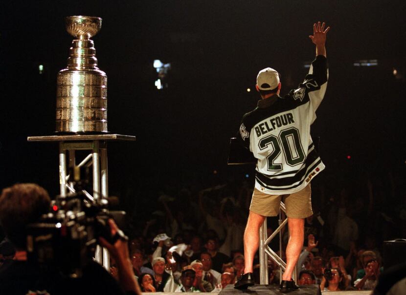 Dallas goalie Ed Belfour enjoys the festivities on stage during the Stanley Cup celebration...