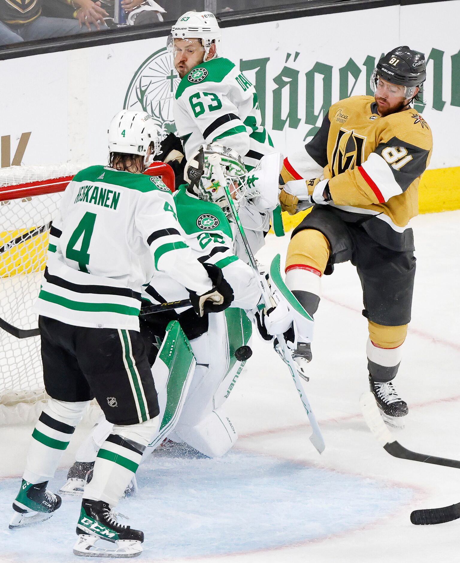 Dallas Stars goaltender Jake Oettinger (29) stops a shot by Vegas Golden Knights center Ivan...